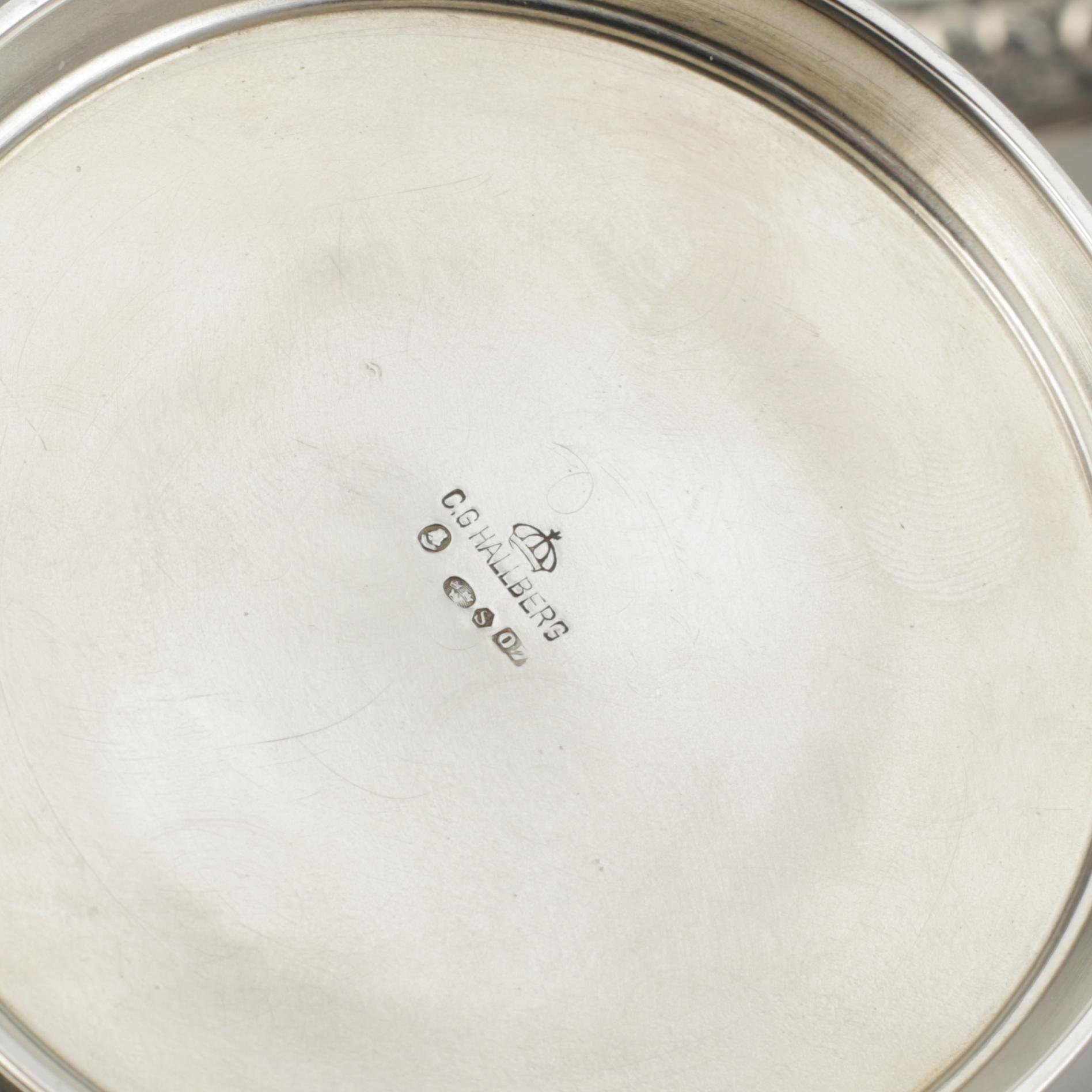 A three pieces silver coffee service from CG Hallberg, Stockholm 1916.