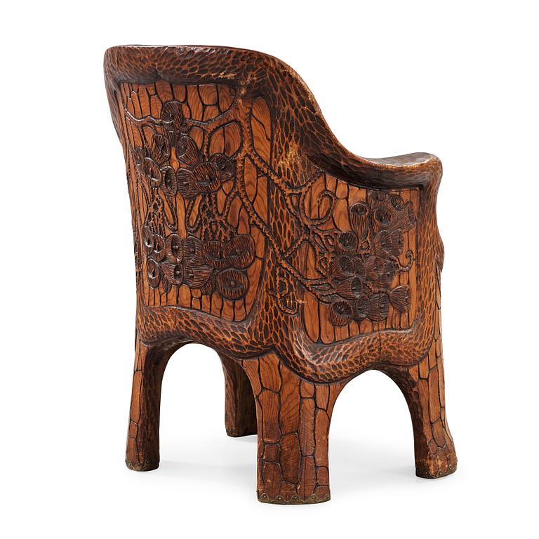 A Gustaf Fjaestad Art Nouveau carved pine chair 'Stabbestol', by Adolf Swanson, Arvika, Sweden 1908.