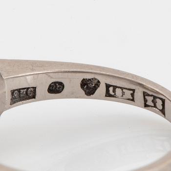 An 18K white gold ring set with an old-cut diamond 4.55 cts according to engraving.