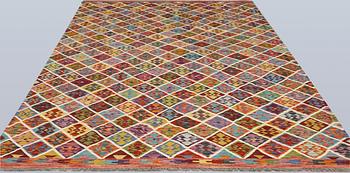A Kilim carpet, approx. 331 x 208 cm.