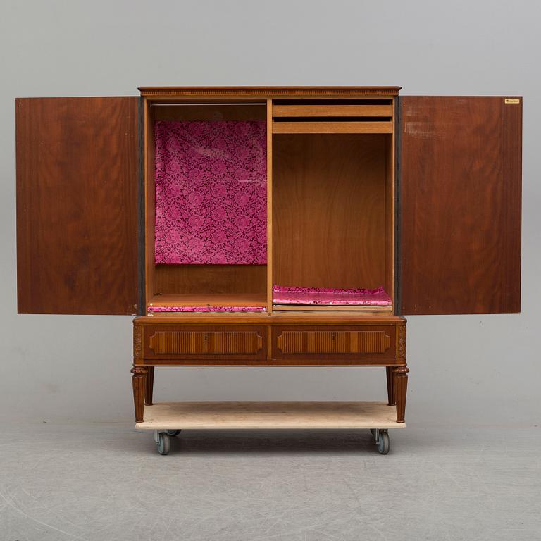 a mid 20th century mahogany cabinet.