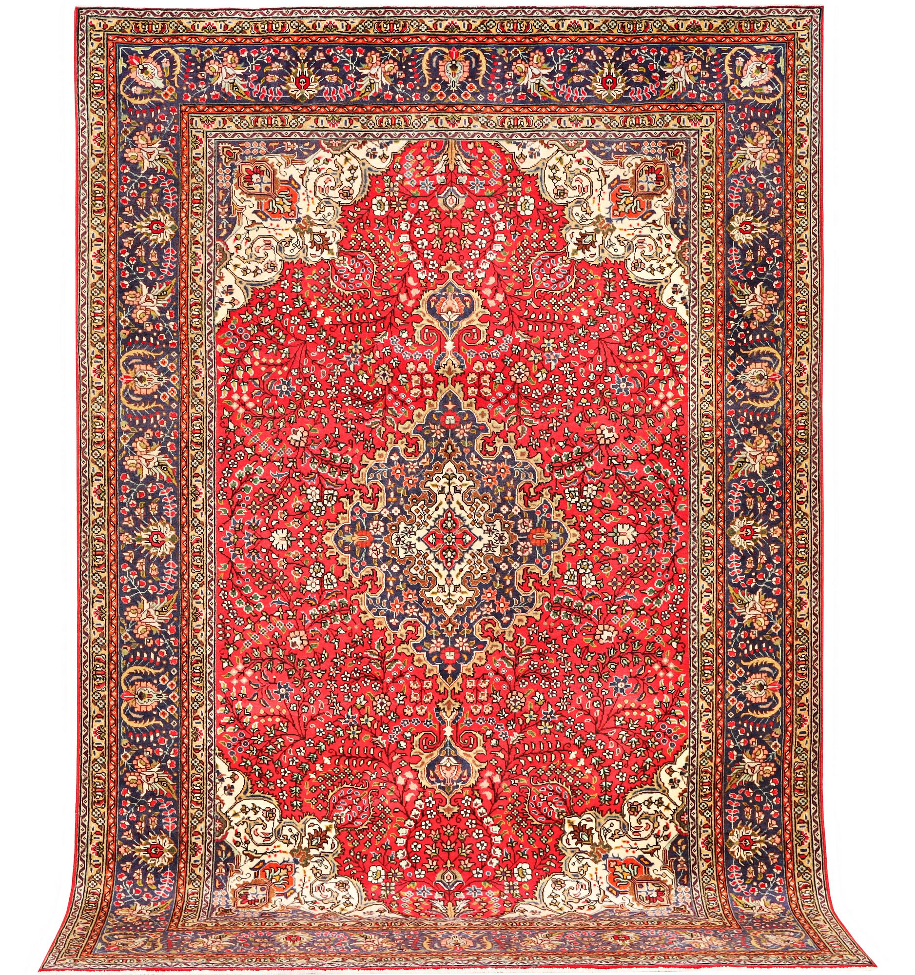 A Tabriz carpet, c 295 x 198 cm.
