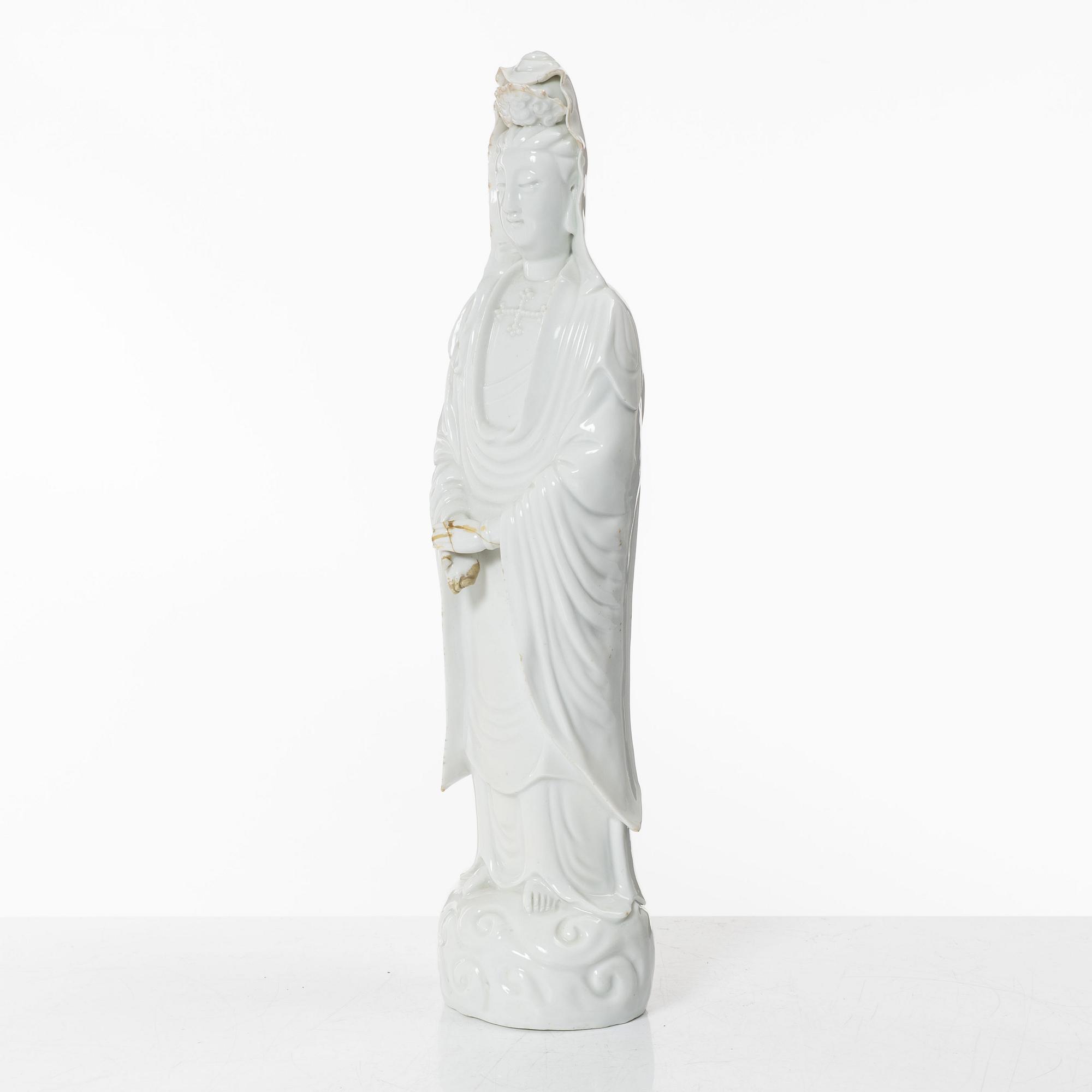 A Chinese blanc-de-Chine porcelain figure of Guanyin, Qing dynasty (1644-1912.