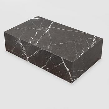 A marble 'Plinth' coffee table from Menu.