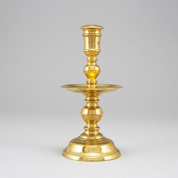 A bronze candlestick, 16th/17th century.