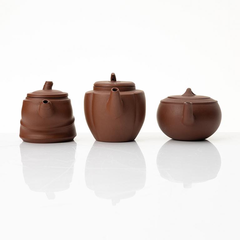 A group of three yixing 'gongfu' teapots, China, 1980s.