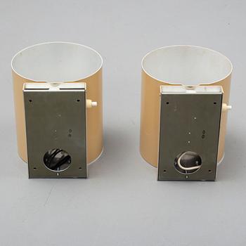 a pair of wall lamps by atelje lyktan in the second half of the 20th century.