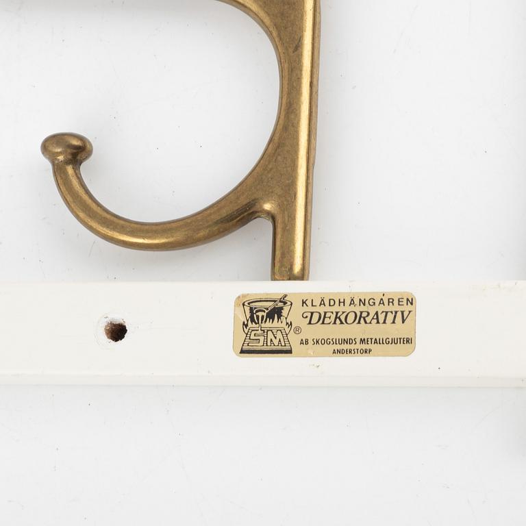 Klädhängare, ett par, "Dekorativ", Skoglunds metallgjuteri, Anderstorp, 1900-talets mitt.