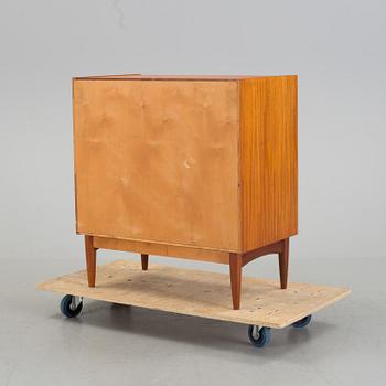 A mid 20th century teak dressing commode.