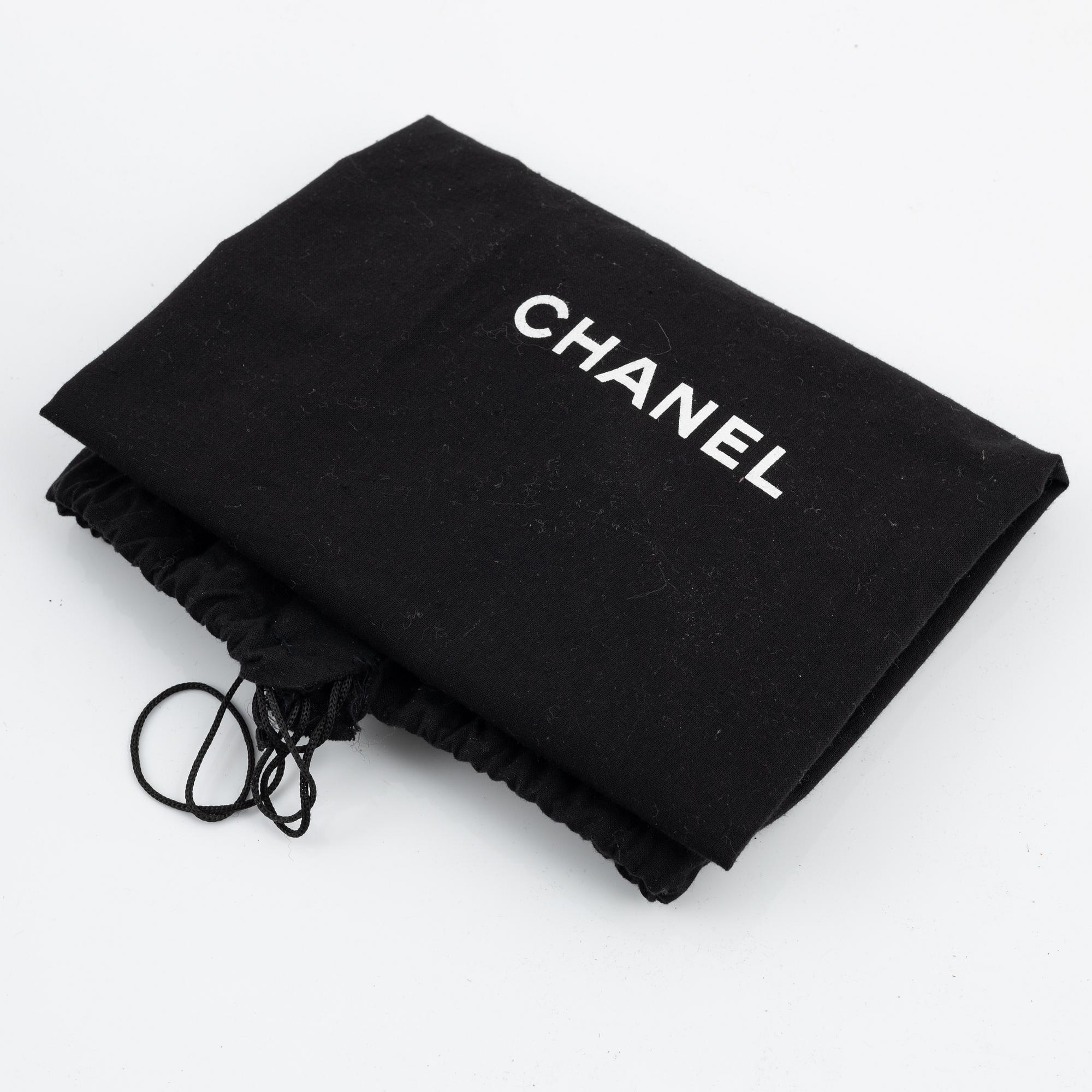 Chanel, a brown leather bag, 2000-2002.