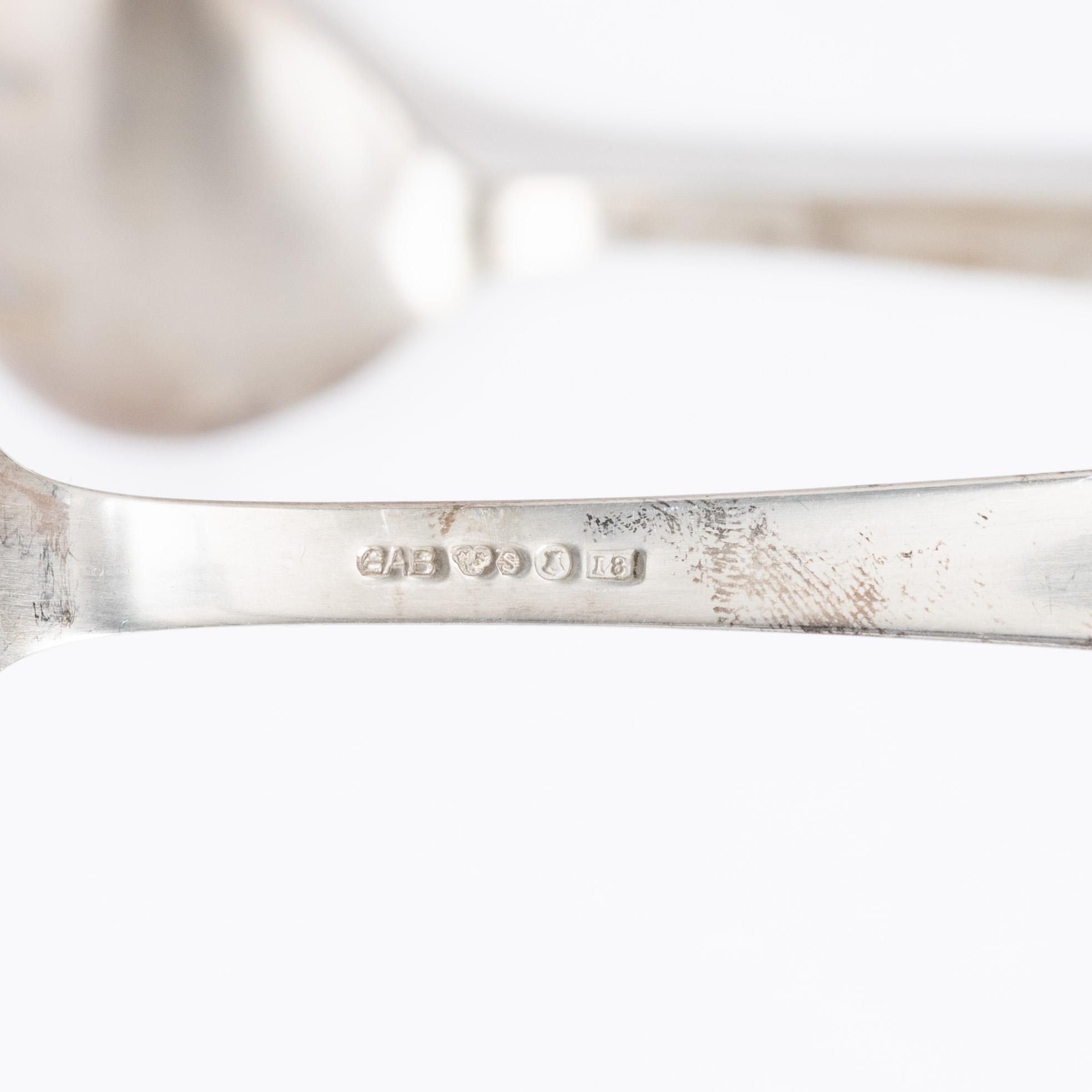 Jacob Ängman, a 50-piece silver flatware set, "Rosenholm", GAB, Stockholm, Sweden, 1935-2001.