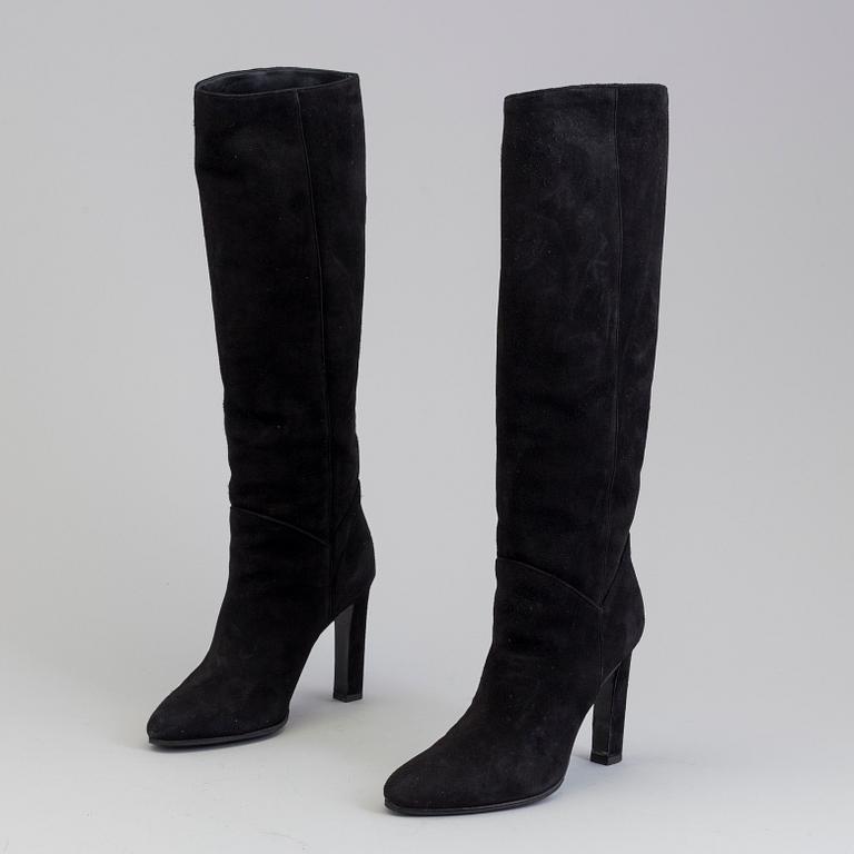 Black suede boots by Yves Saint Lurent.