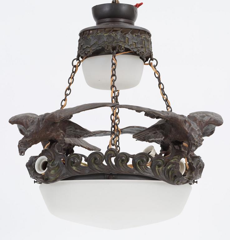 A Swedish Art Nouveau patinated bronze and patinated metal hanging lamp, reportedly designed by Ruth Milles.