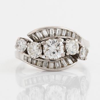Platinum, brilliant and baguette cut diamond ring.