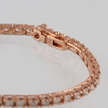 ARMBAND, 18K roséguld med briljantslipade diamanter ca 2.15 ct. Vikt 7,2 gram.