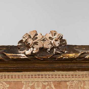 A pair of Louis XVI-style armchairs and a sofa, 20th century.