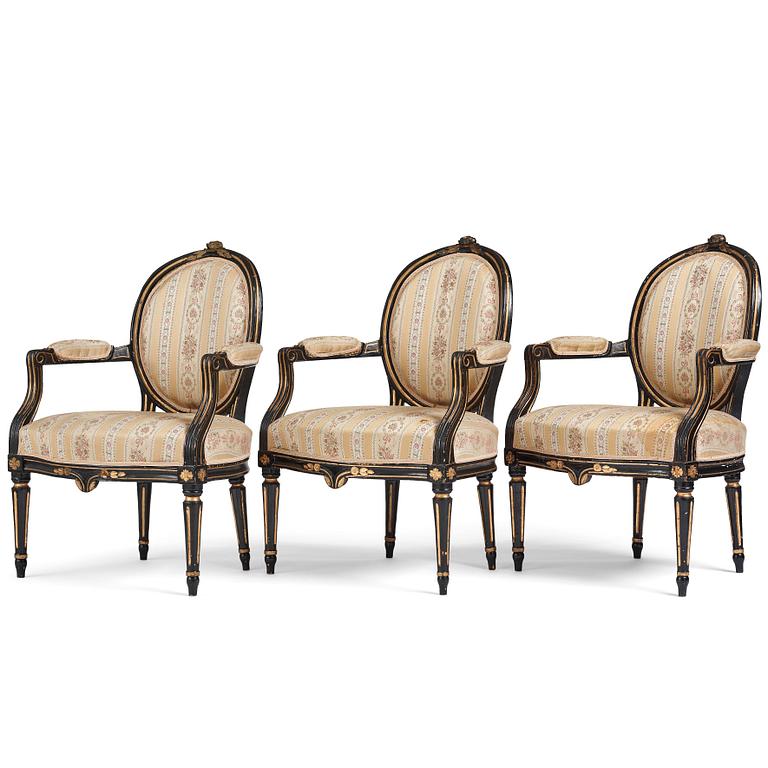 A set of three Gustavian armchairs E Holm.