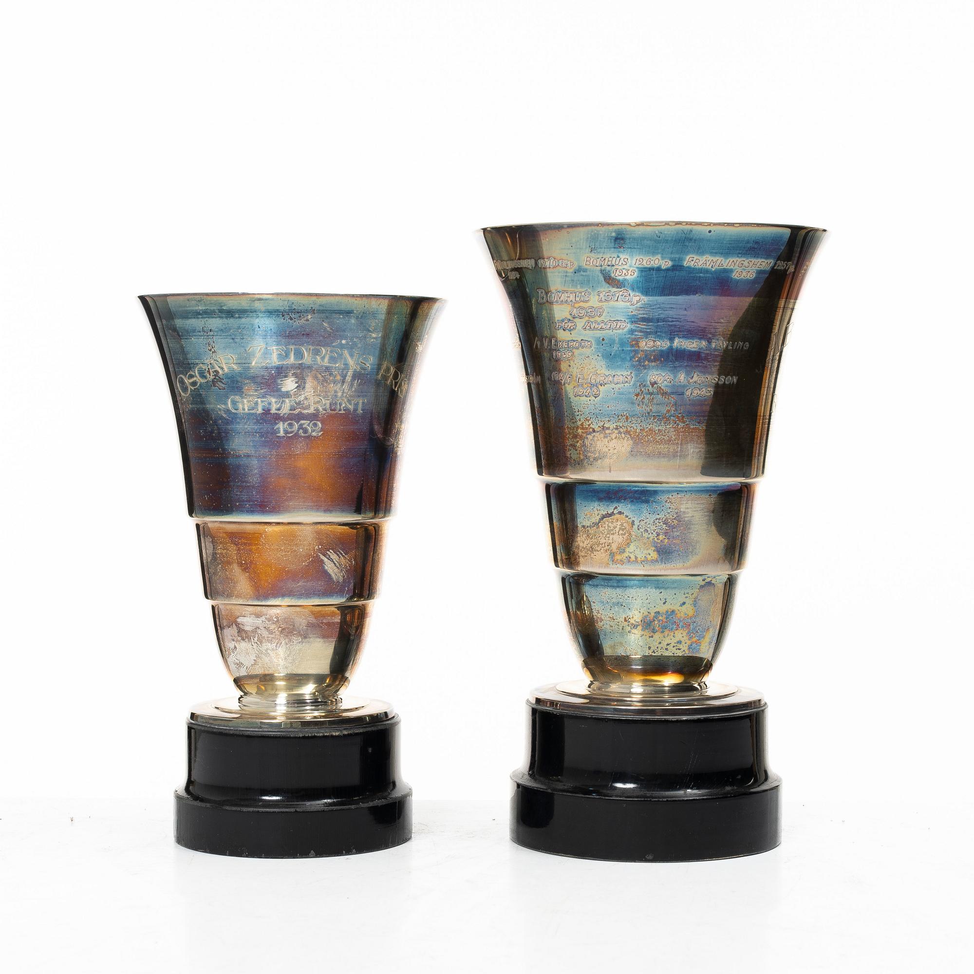 Guldsmedsaktiebolaget (GAB), Two silver vases on wooden bases, Stockholm 1931-1933.