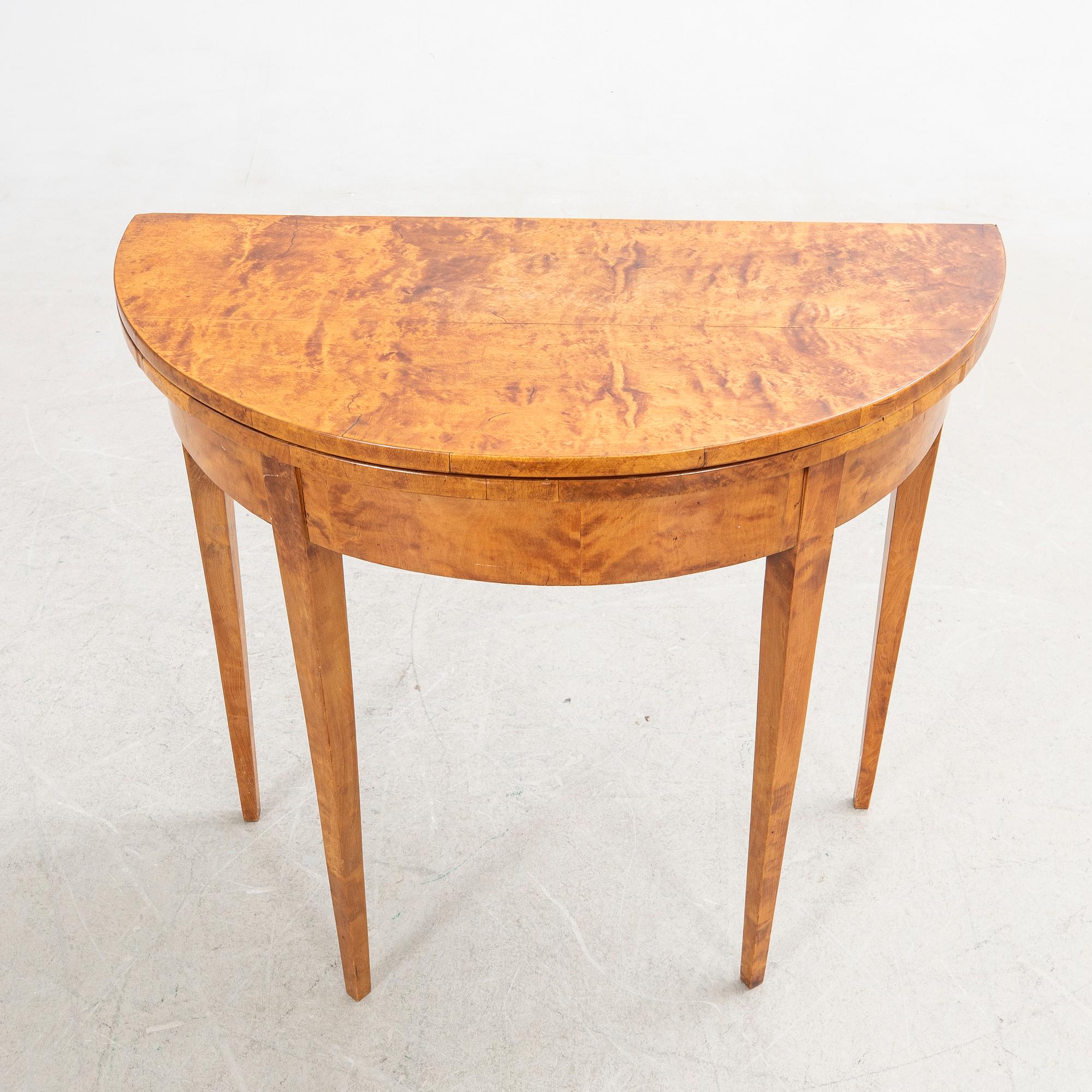 Half-moon table, 19th century.