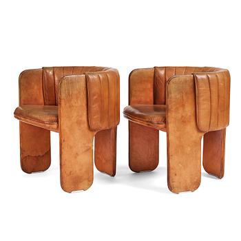 76. Luigi Massoni, a pair of easy chairs, Poltrona Frau, Italy 1970's.