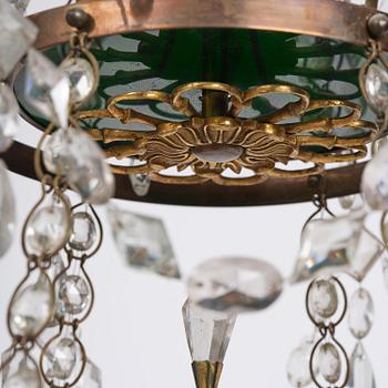 A Late gustavian green top glass six light chandelier.