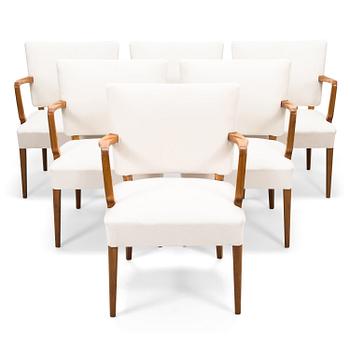 A set of six 1950's open arm chairs for Oy Paul Boman Ab.