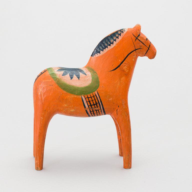 A painted folk art dala horse first half of the 20th century.
