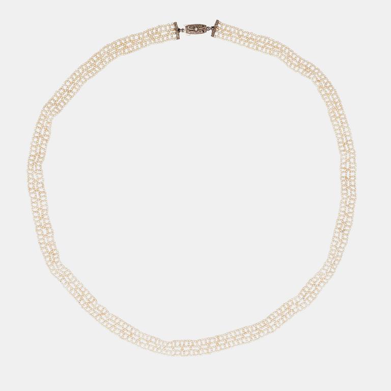 A natural seed pearl lace necklace.