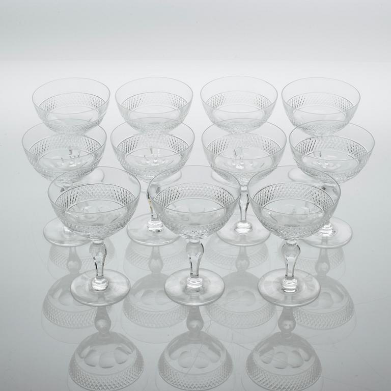 Eleven glass champagne cups, around mid 20th century.
