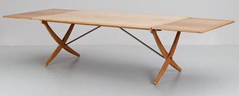 A Hans J Wegner oak dinner table by Andreas Tuck, Denmark, 1950's-60's.