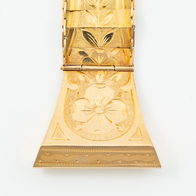 Chatelaine, 18K gold.