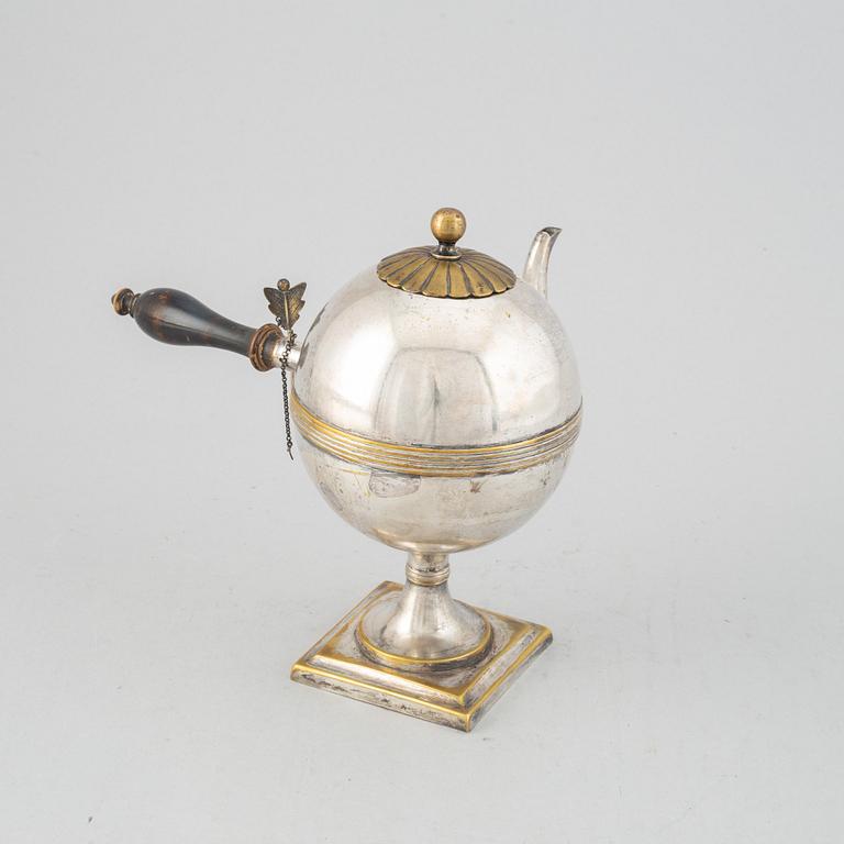 An Empire 19th century silvered brass teapot.