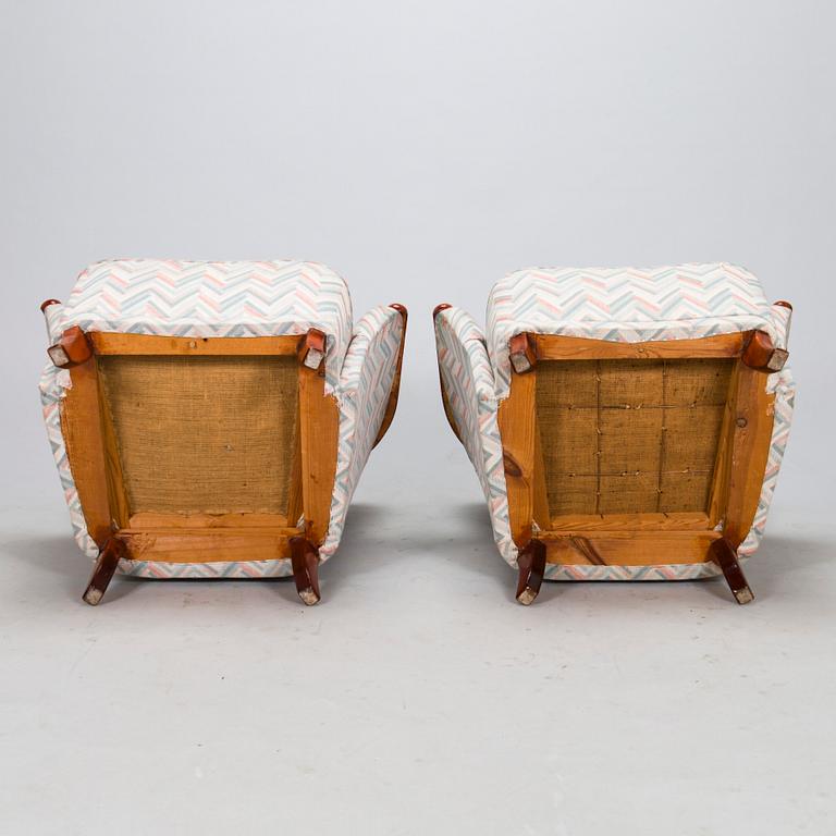 A pair of armchairs, mid-20th century.