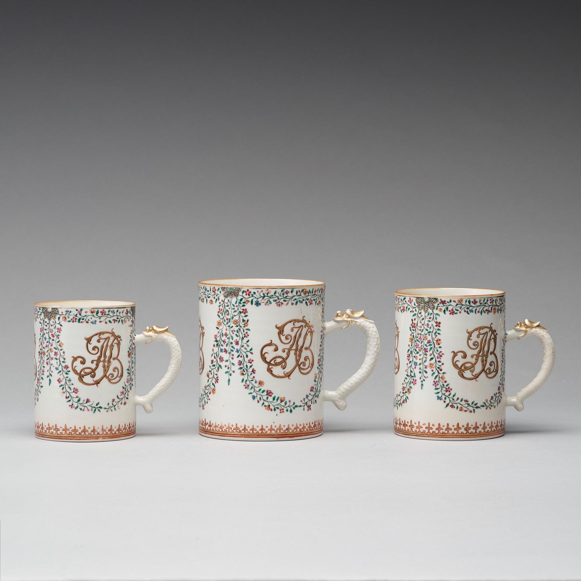 A group of three famille rose armorial jugs, Qing dynasty, Qianlong (1736-95).