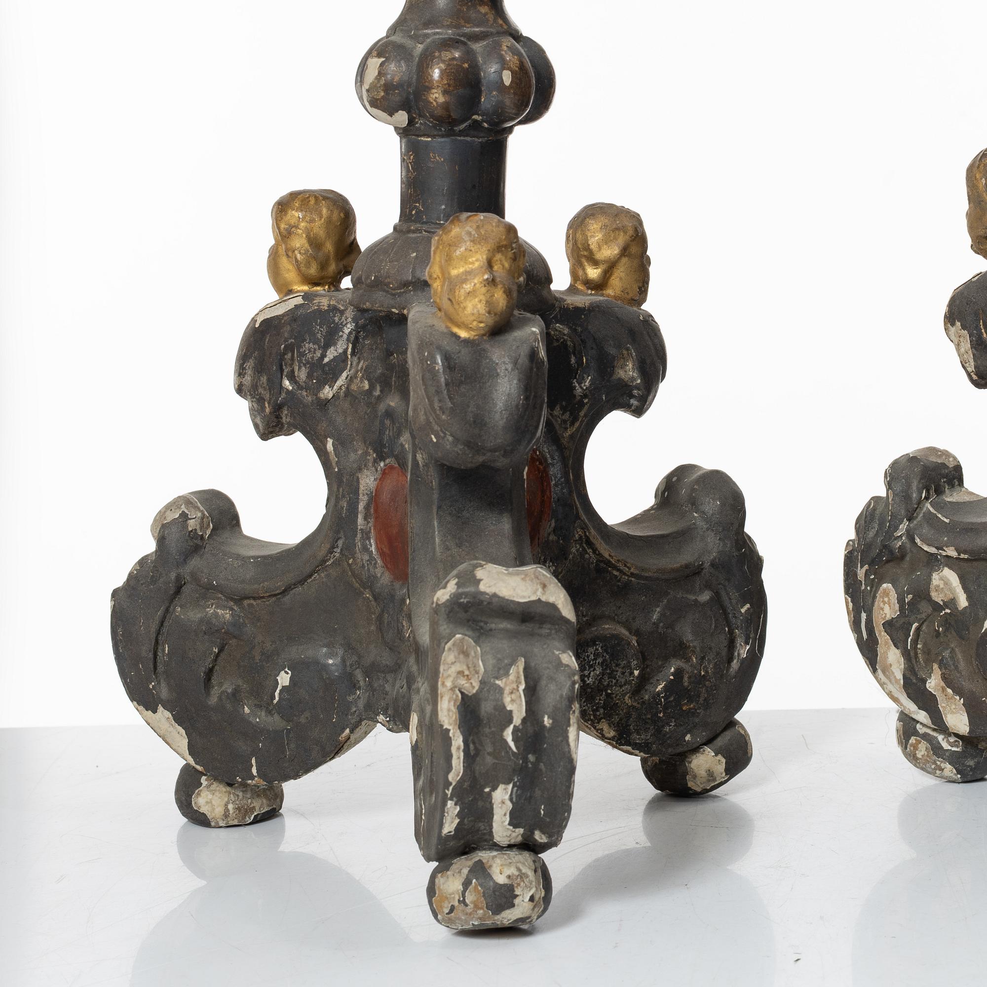 A pair of Baroque style candleholders, 19th Century.