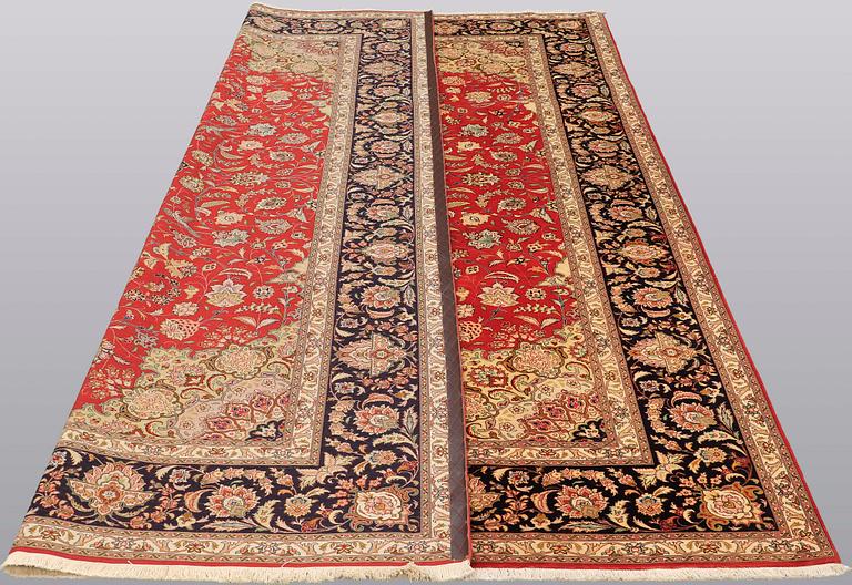 A carpet, Täbriz part silk, 341 x 248 cm.
