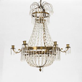 An Empire-style six-light chandelier, circa 1900.