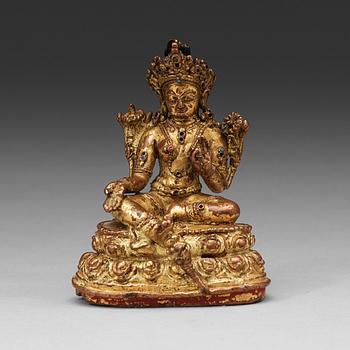 GRÖN TARA, förgylld kopparlegering. Tibet, 1500-tal eller tidigare.