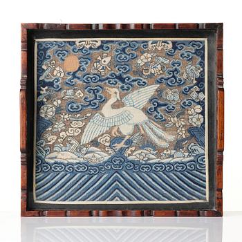 A Chinese kesi insignia/buzi mounted in a tray, late Qing dynasty.