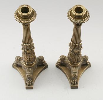 LJUSSTAKAR, 1 par, brons, senempire, omkring år 1830.