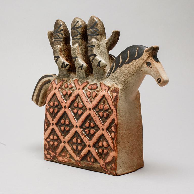 LISA LARSON, a stoneware figurine for K-studion at Gustavsberg, signed, second half of the 20th century.