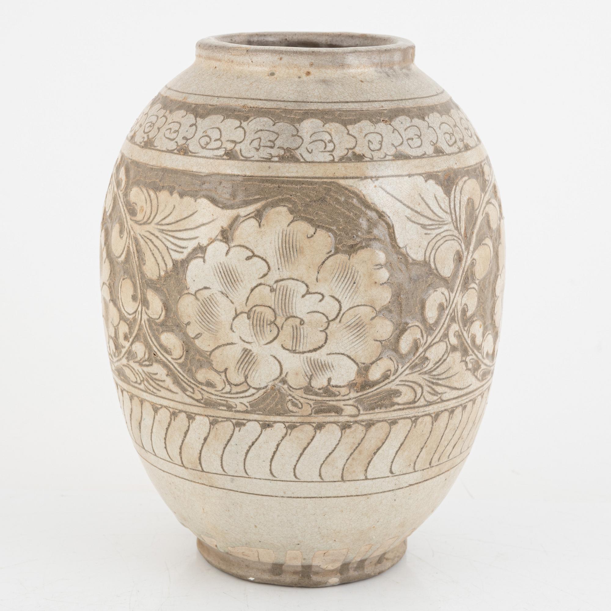 A Chinese glazed stoneware jar, probably Ming dynasty (1368–1644).