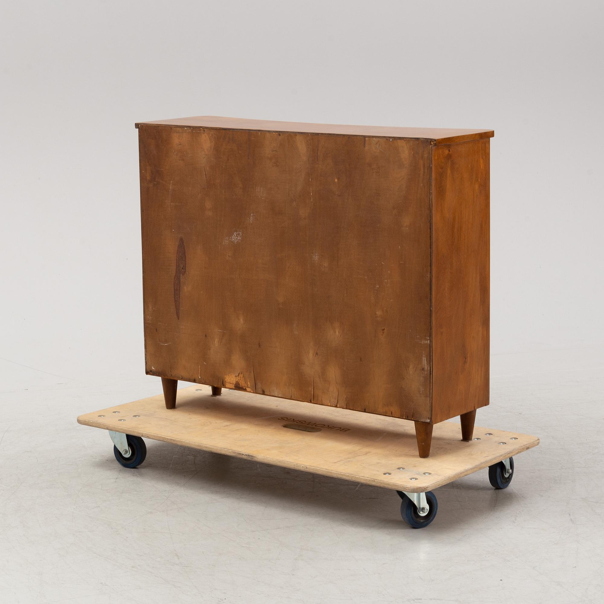 A Swedish Modern cabinet, 1940-50s.