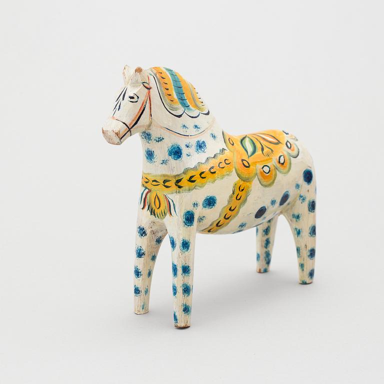 A painted folk art dala horse first half of the 20th century.