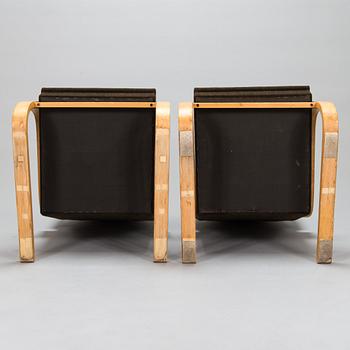 Alvar Aalto, A pair of mid-20th century '34/401' armchairs for O.Y. Huonekalu- ja Rakennustyötehdas A.B. Finland.