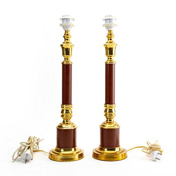 A pair of table lamps alter part of the 20th century.