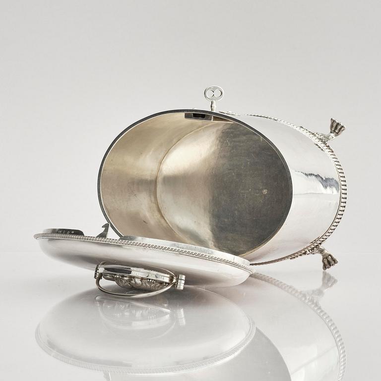 A Swedish 19th century silver sugar-casket and tong, marks of Adolf Zethelius, Stockholm 1819.