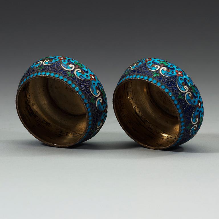A pair of Russian early 20th century silver-gilt and enamel salts, unidentified makers mark, Moscow 1899-1908.