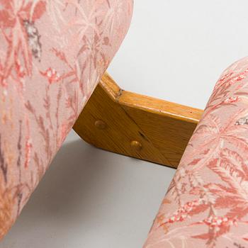 Ilmari Tapiovaara, an early 1960s 'Dolphin chair' for Skanno.