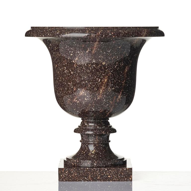 A Swedish Empire 'Blyberg' porphyry Medici shaped urn, early 19th century.